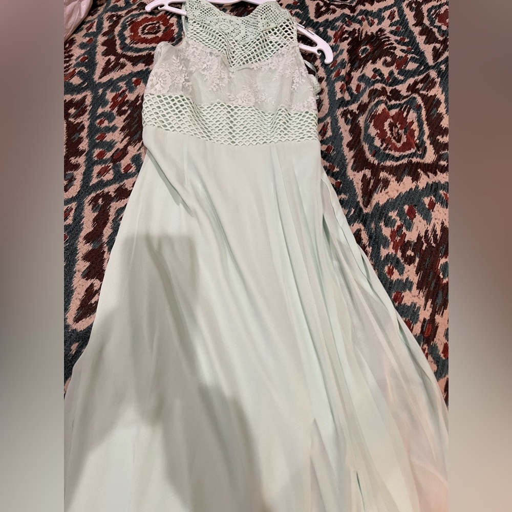Beautiful mint green long party dress with side slit.
